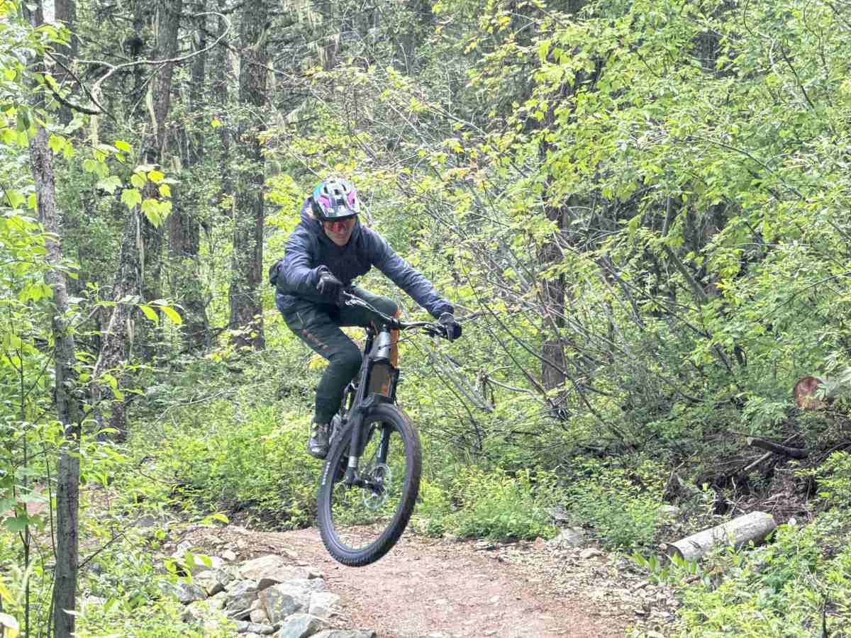 Athlete Dane Tudor popping a jump on the Levo 4 EVO Pro e-mountain bike; (photo/Morgan Tilton)
