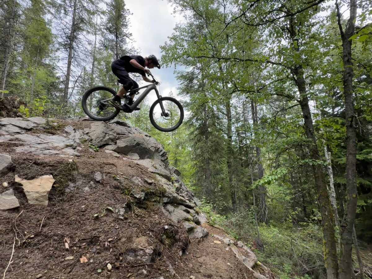 Athlete Dane Tudor hitting a steep rock roll on the Levo 4 EVO Pro e-mountain bike; (photo/Morgan Tilton)