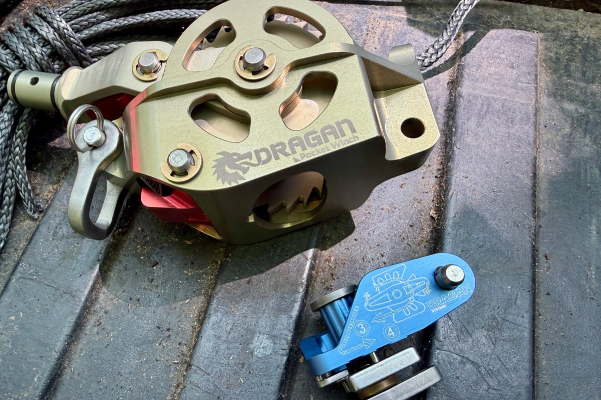 Pocket winch and blue capio device laid out on a truck tailgate