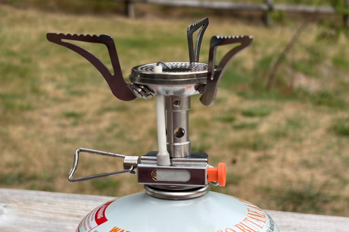 close-up shot of the gsi glacier stove hooked up to fuel container