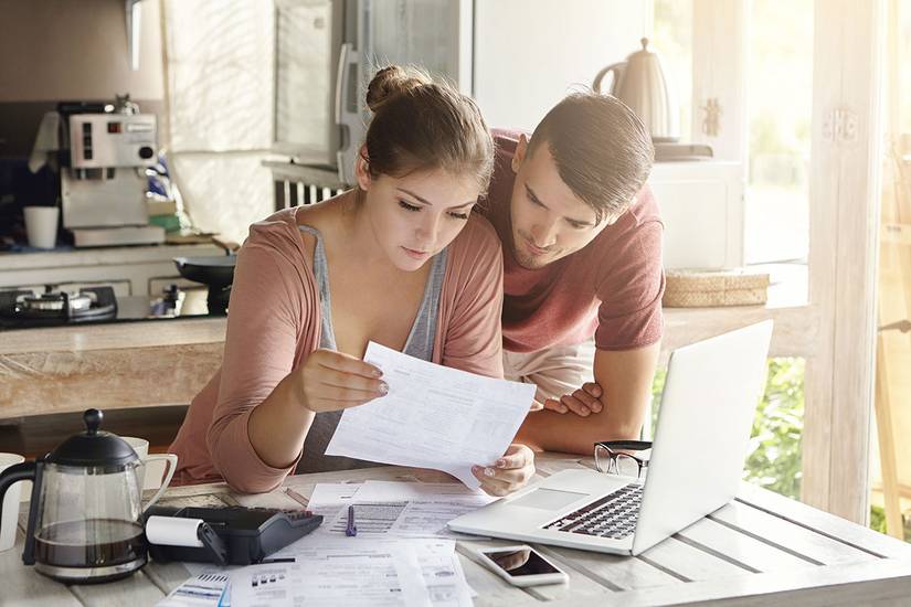 A couple looking at paperwork