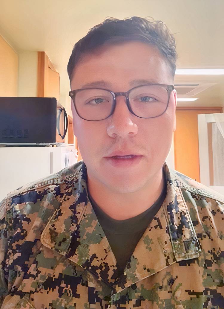 U.S. Marine Lance Cpl. Michael Casillas is with his beloved dog, Margaery, again after being separated during his deployment to Japan. (Paws of War/Facebook).