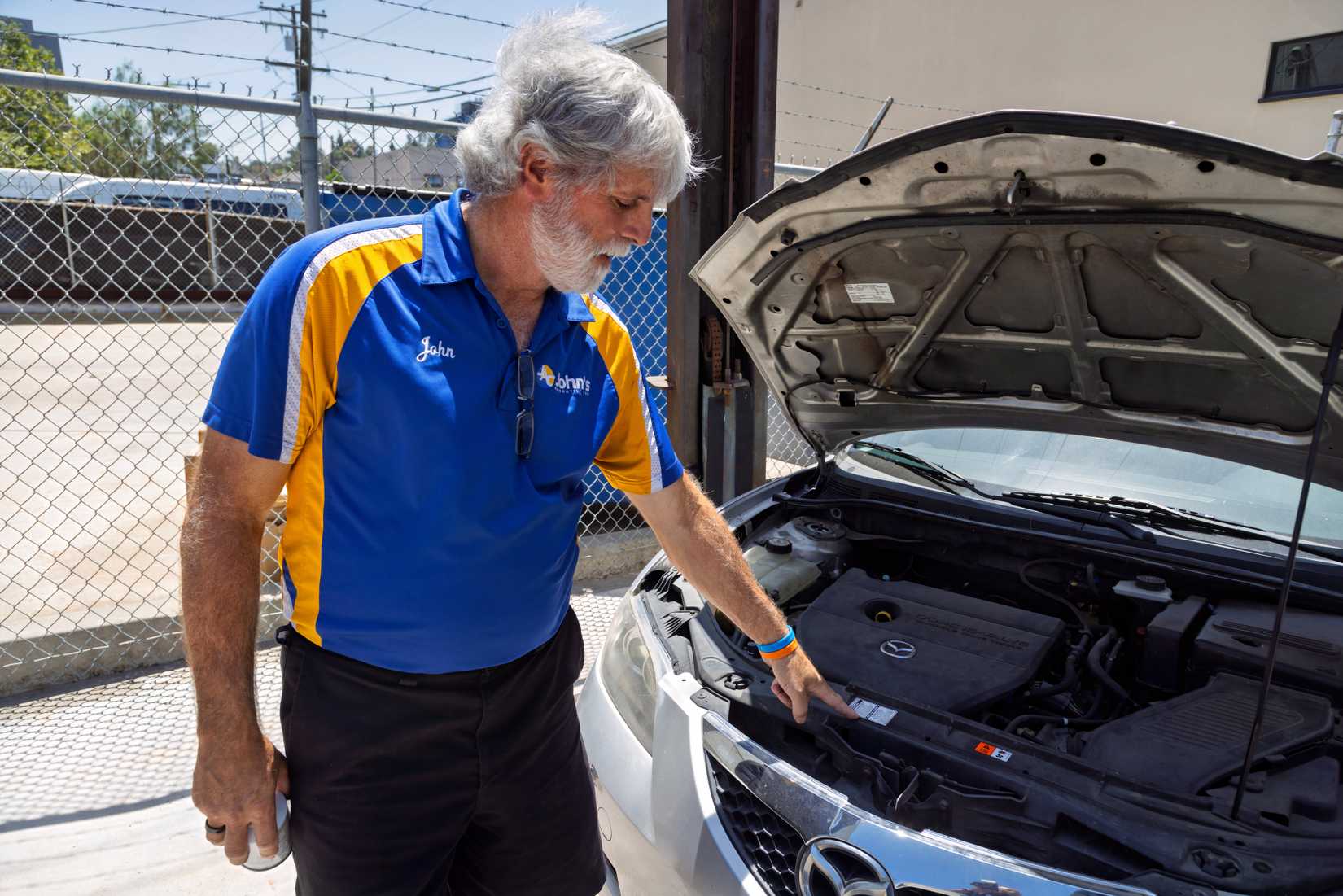 Local mechanic John Eppstein participates in California's 'Cool Air Rebate' program. (Car Care Council).