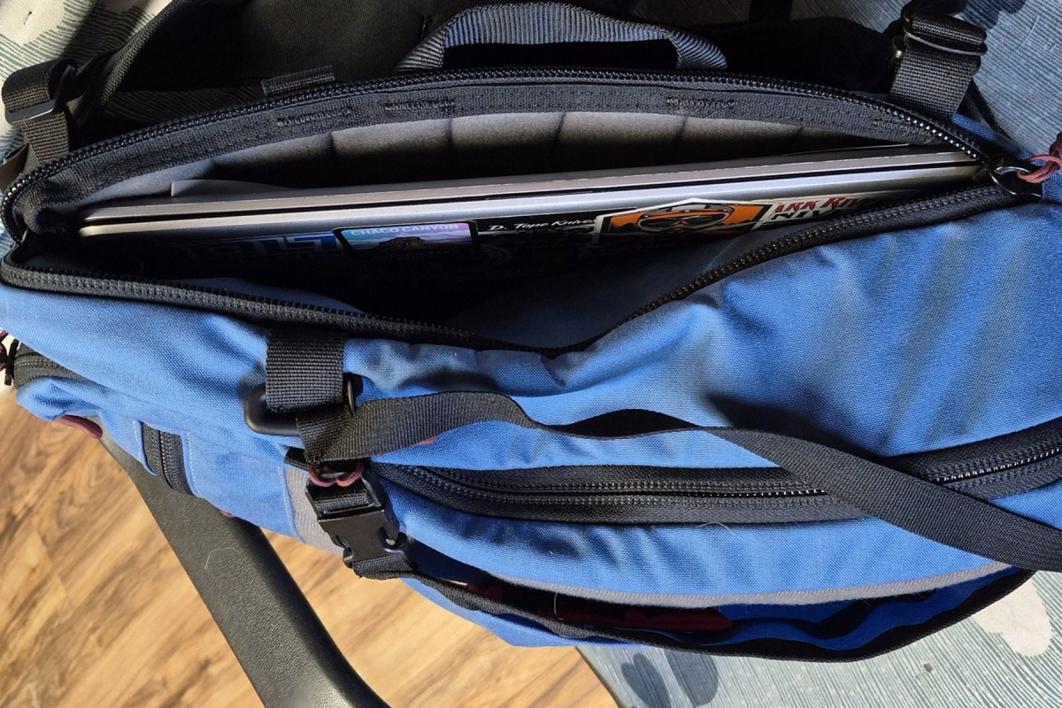 Laptop stored in the padded compartment of the Hill People Gear Commuter