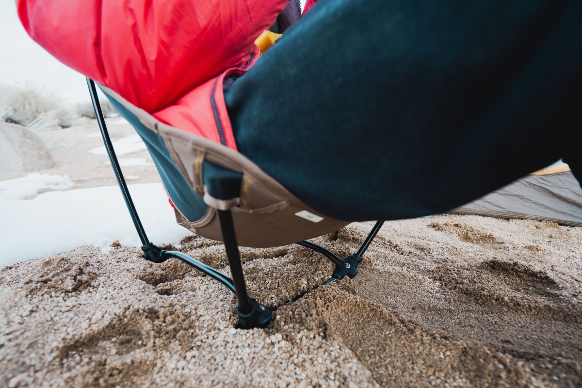 a detail of the square-shaped base of a helinox chair that has great stability across uneven surfaces