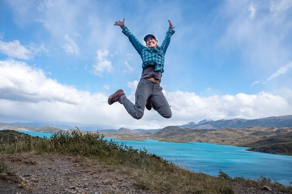 Woman testing the The North Face Off-Trail Hiking Boots near a lake in Patagonia
