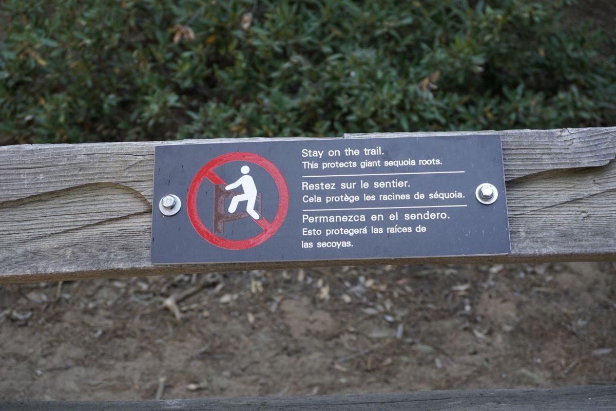 sign about staying on trail
