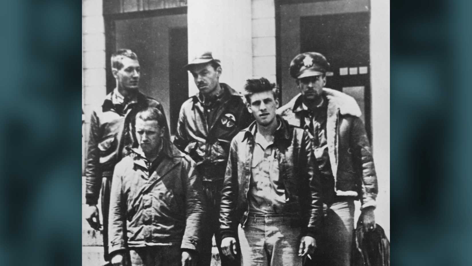 Five captured Doolittle Raiders stand outside a building in Nanchang, China, in April 1942.