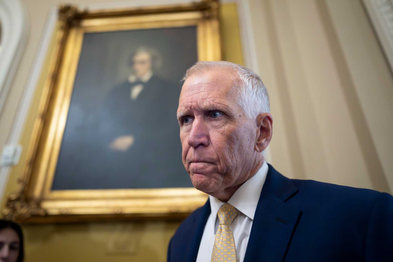 Sen. Thom Tillis speaks with reporters. 