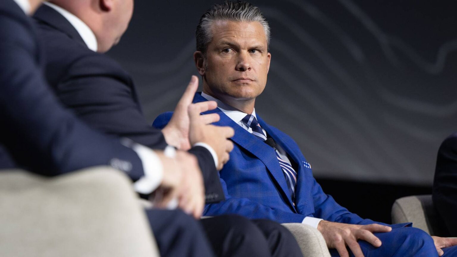 Pete Hegseth Jokes as Multiple Protesters Call Him ‘War Criminal’ at Army Conference